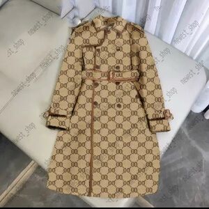 Tan Monogrammed Women's trench Coat with leather trim size L or 10-12